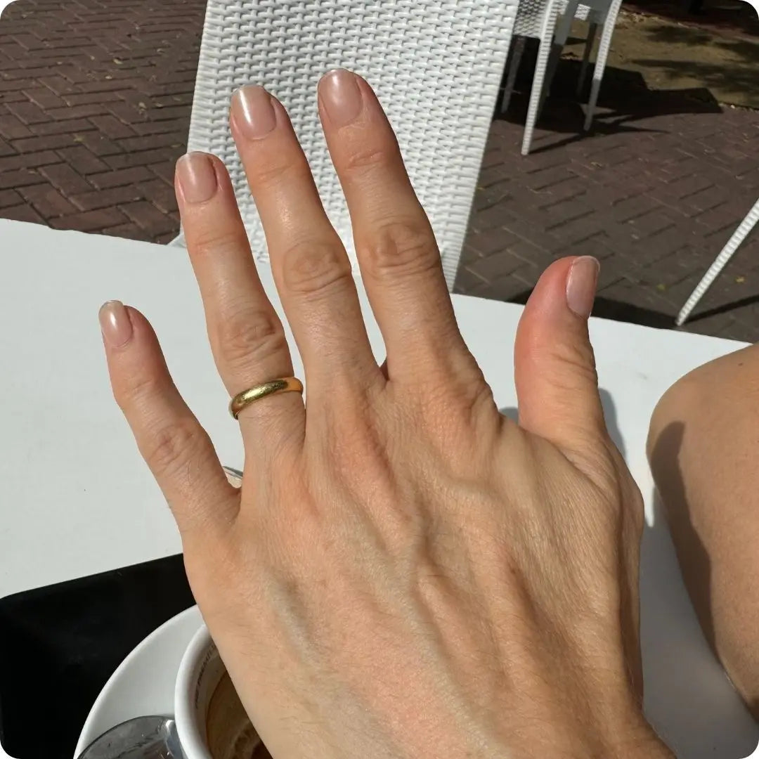Natural nude gel nail strips, glossy almond nails on one hand
