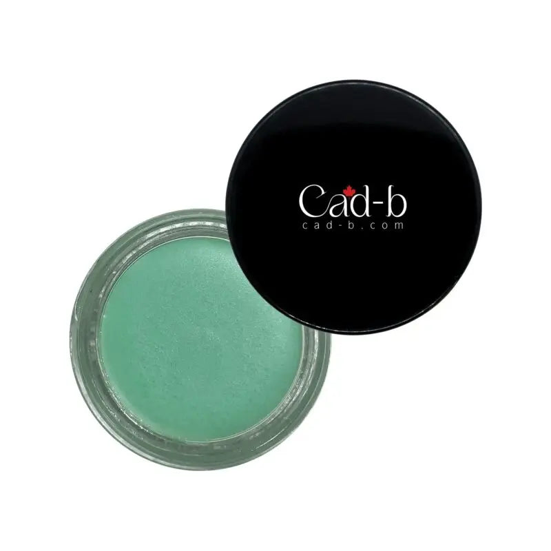 Mintgrüner Lip Scrub in transparenter Dose mit schwarzem Deckel