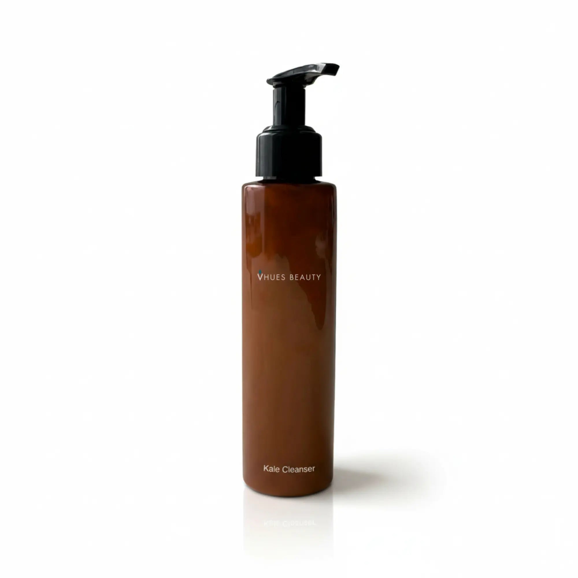Kale Cleanser bottle with black pump, amber glass and minimal branding