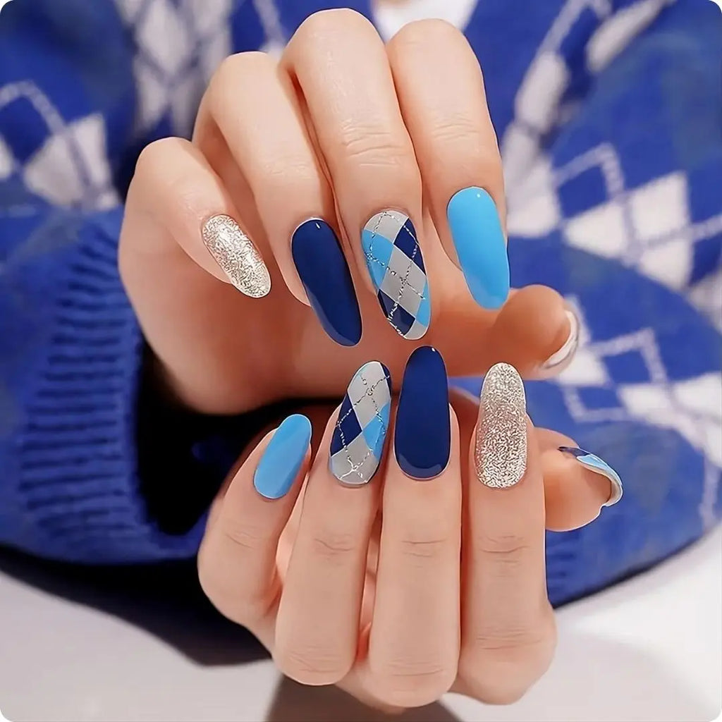 Elegant Blue long oval nails: light blue, navy, silver glitter and blue/white diamond stripes