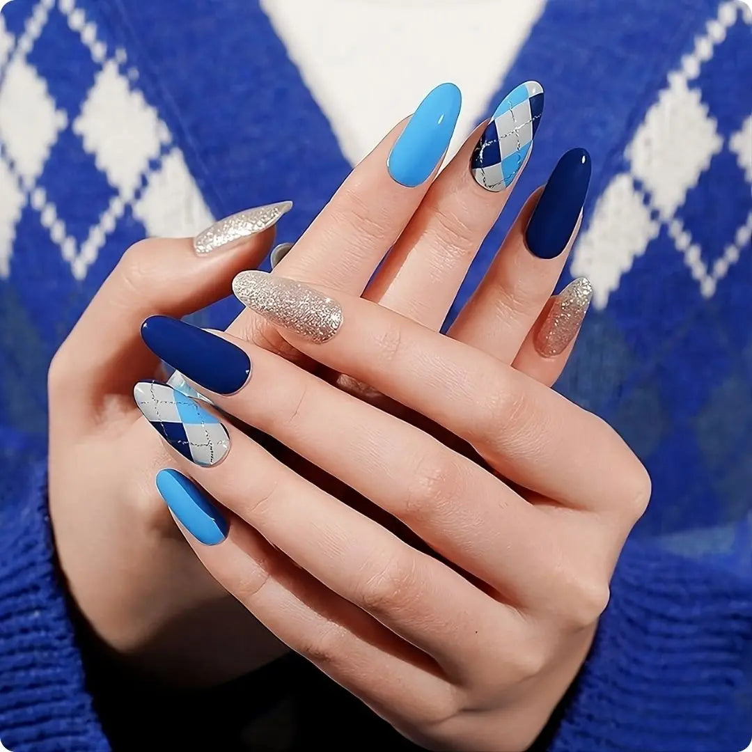 Elegant Blue nails with long oval shapes, blue-and-white argyle and navy accent nails