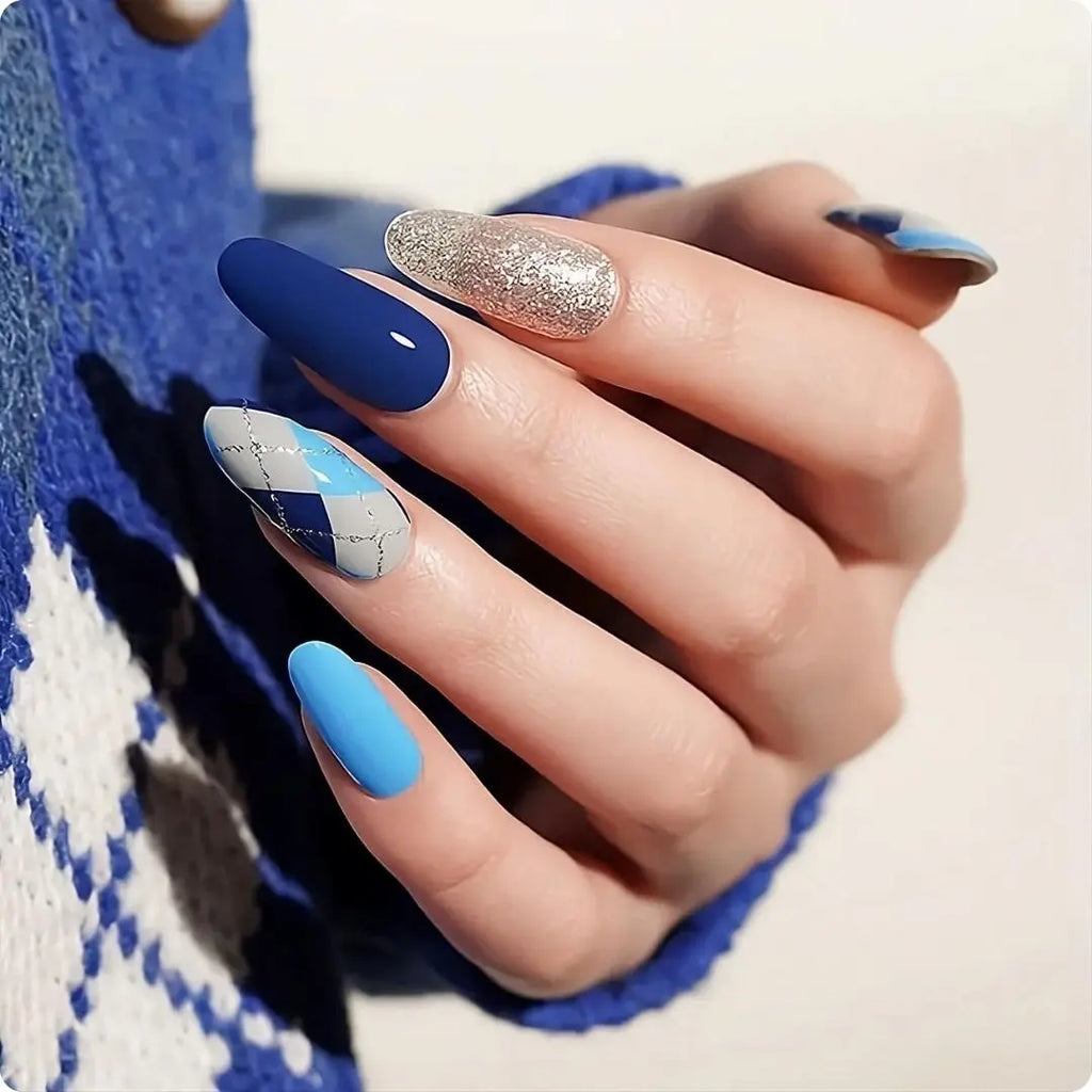 Elegant Blue close-up nails: matte navy, light blue, silver glitter and cracked plaid design
