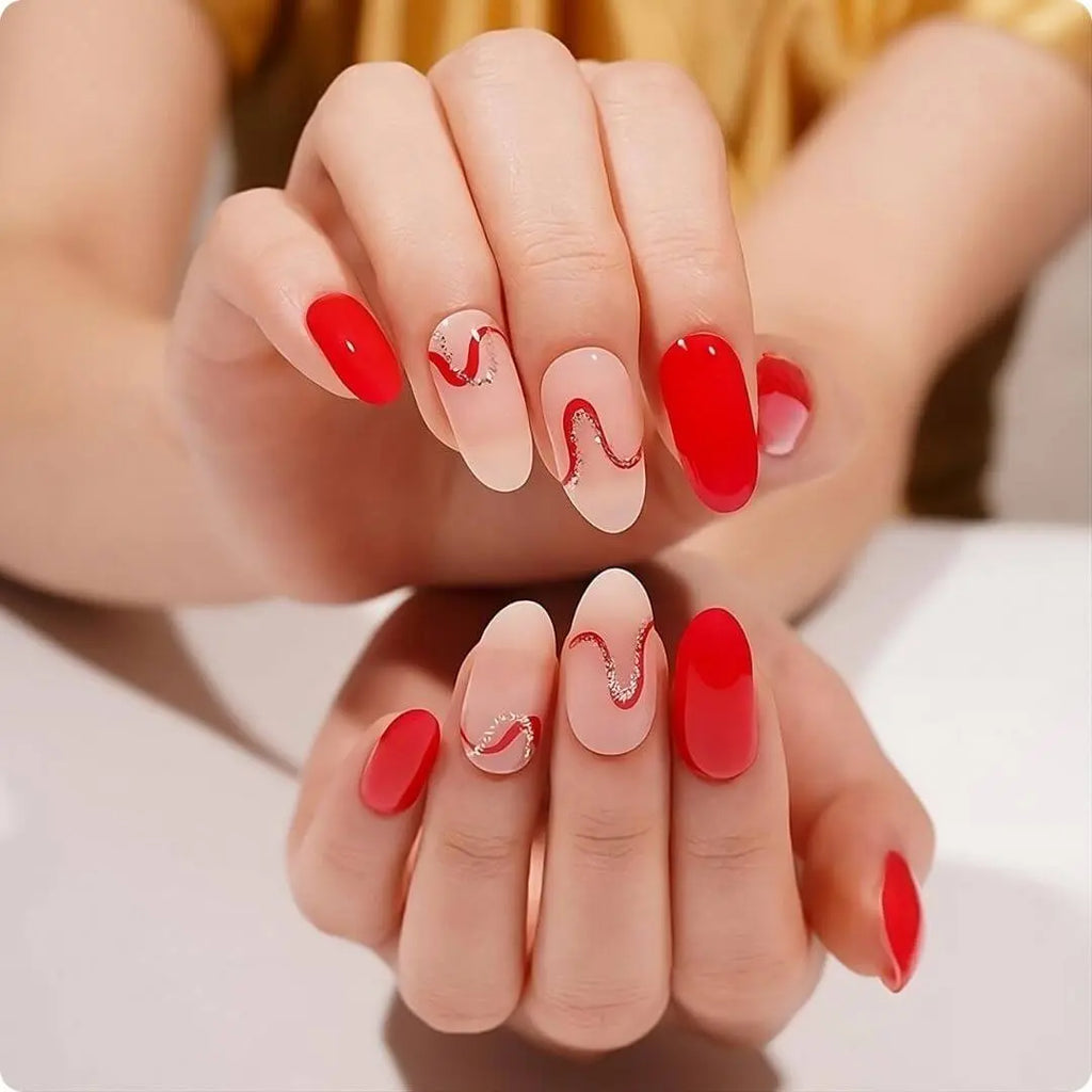 Assorted Red Waves nails: glossy red blocks and nude nails with red curl wave lines.