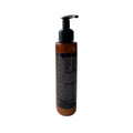 Kale Daily Cleanser bottle with black pump, amber label side view