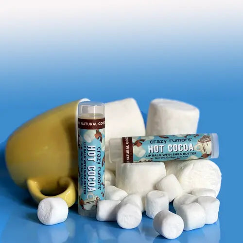 Hot Cocoa lip balm tubes with mini white balm pieces; labels show “HOT COCOA”