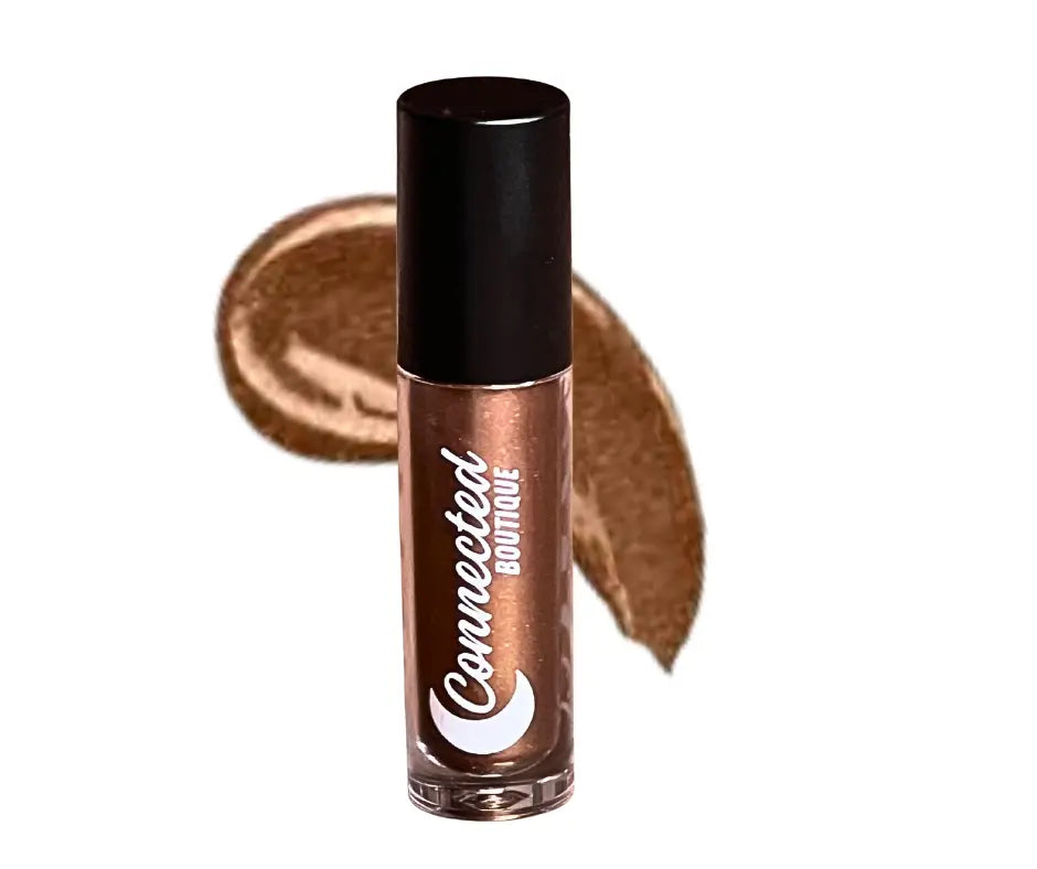 Brown metallic lip gloss in clear tube with dark cap and brown shimmer swipe