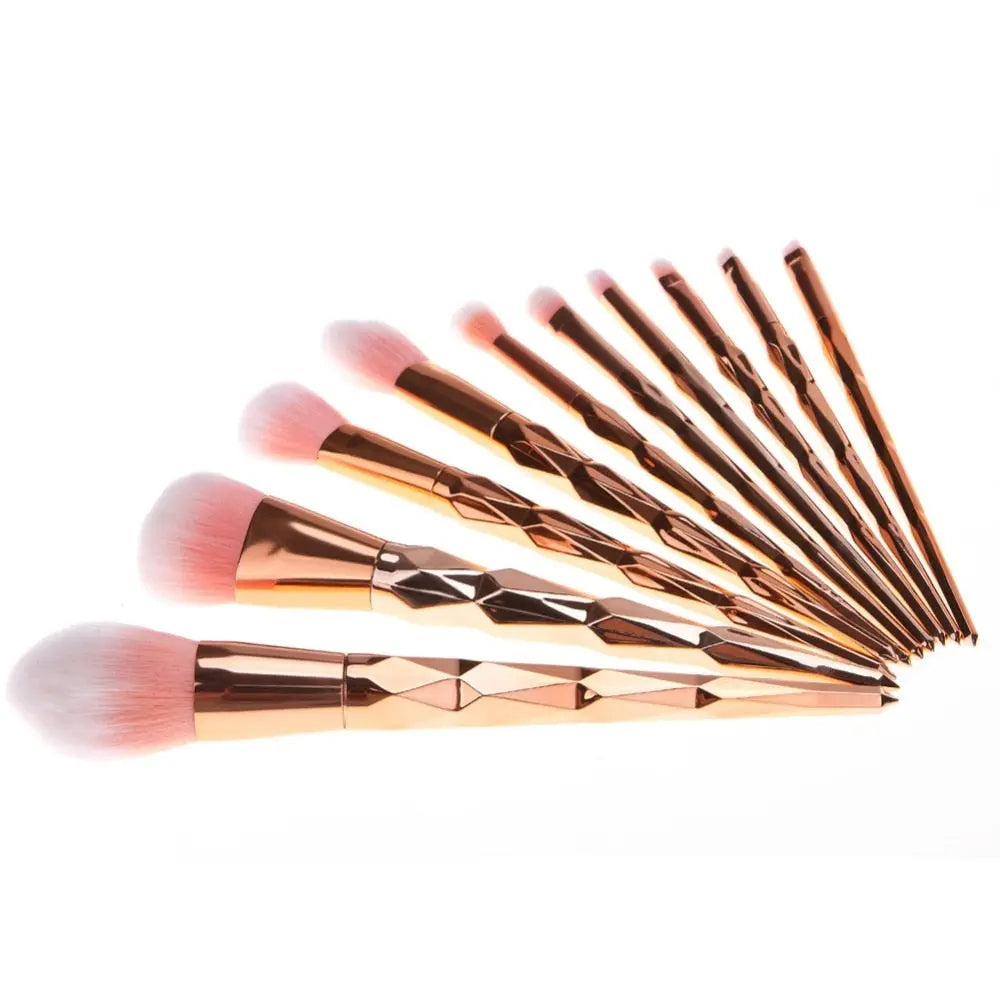 11-piece makeup brush set with rose-gold handles and soft pink mermaid tips