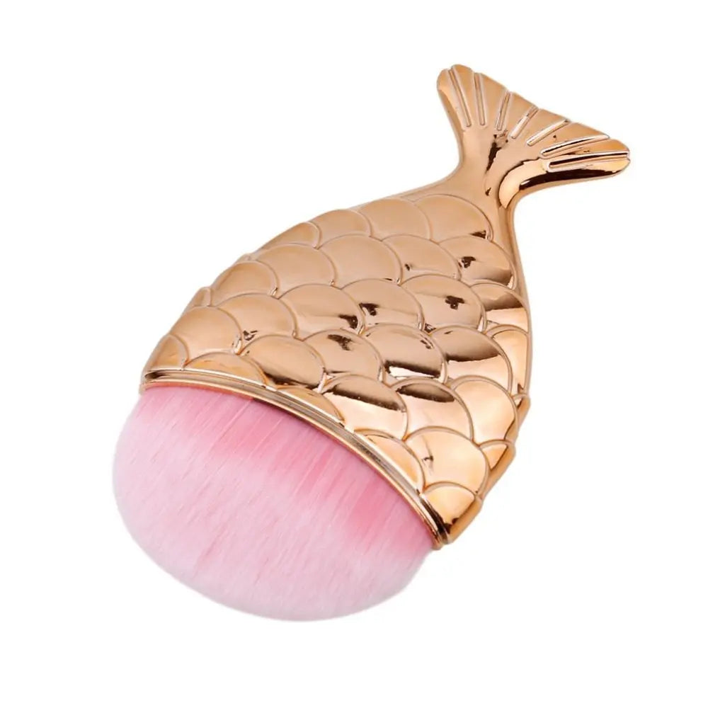 Mermaid fishtail makeup brush head with pink bristles and rose-gold scale handle