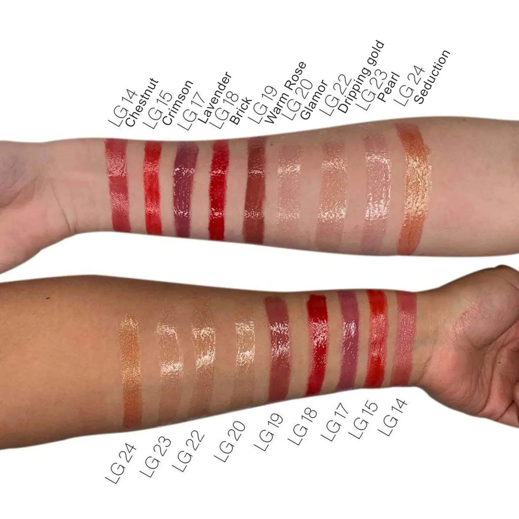 Lip gloss swatches on arm with nude beige, rosy and red glossy stripes