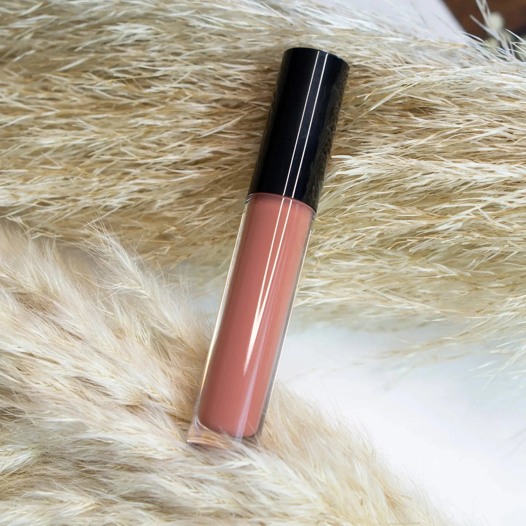 Nude lip gloss applicator wand with sheer beige-mauve gloss