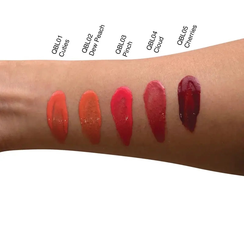 Arm swatches: QBL02 Dew Peach liquid cheek blush among other shades