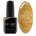 Luxio Sparkles Goddess UV gel bottle and gold glitter nail swatch