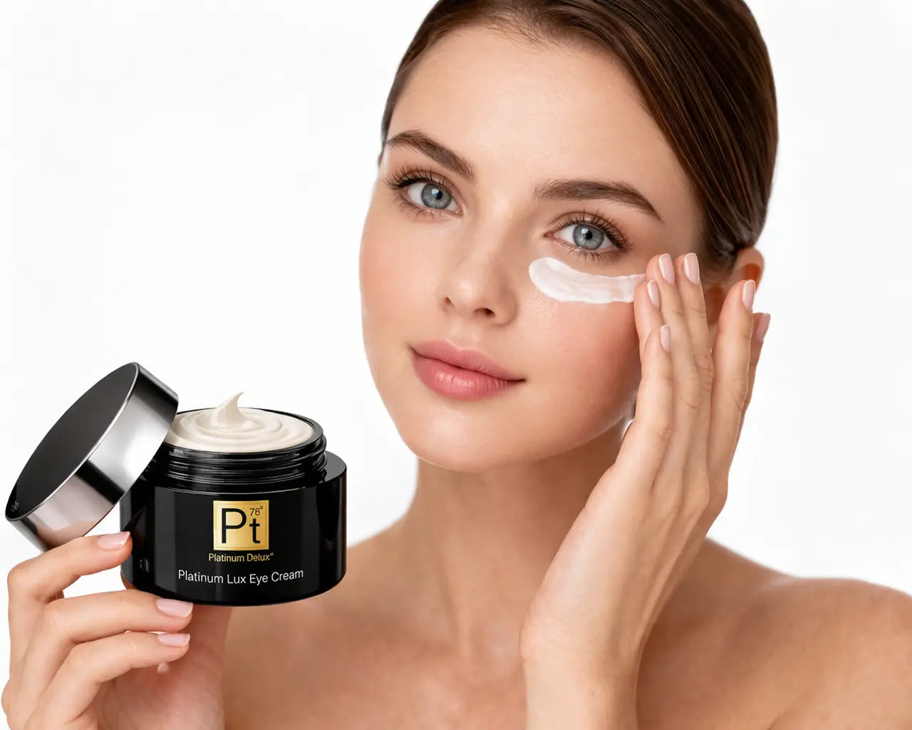 Platinum Lux Eye Cream jar with open lid and pale cream applied near the eye