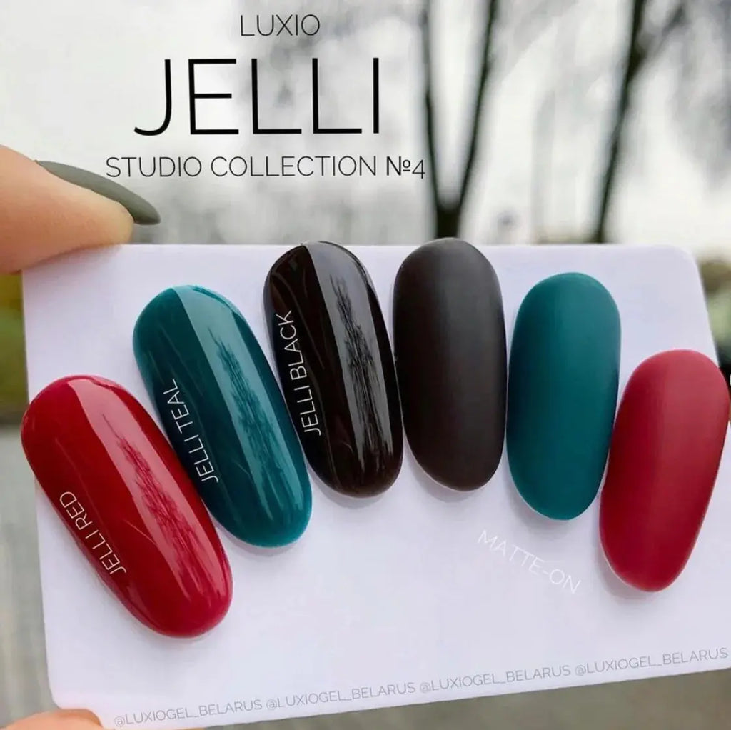 Jelli Red swatch card with glossy deep red oval nails
