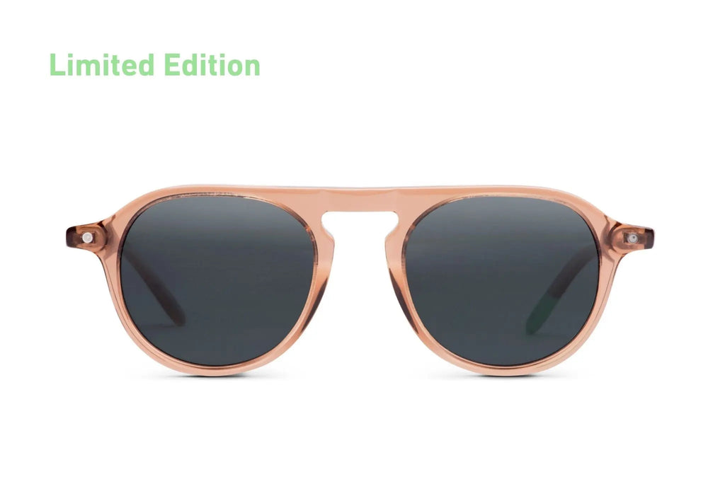 Zingaro Toffee sunglasses with round pink frames and dark tinted lenses