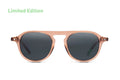 Zingaro Toffee sunglasses with round pink frames and dark tinted lenses
