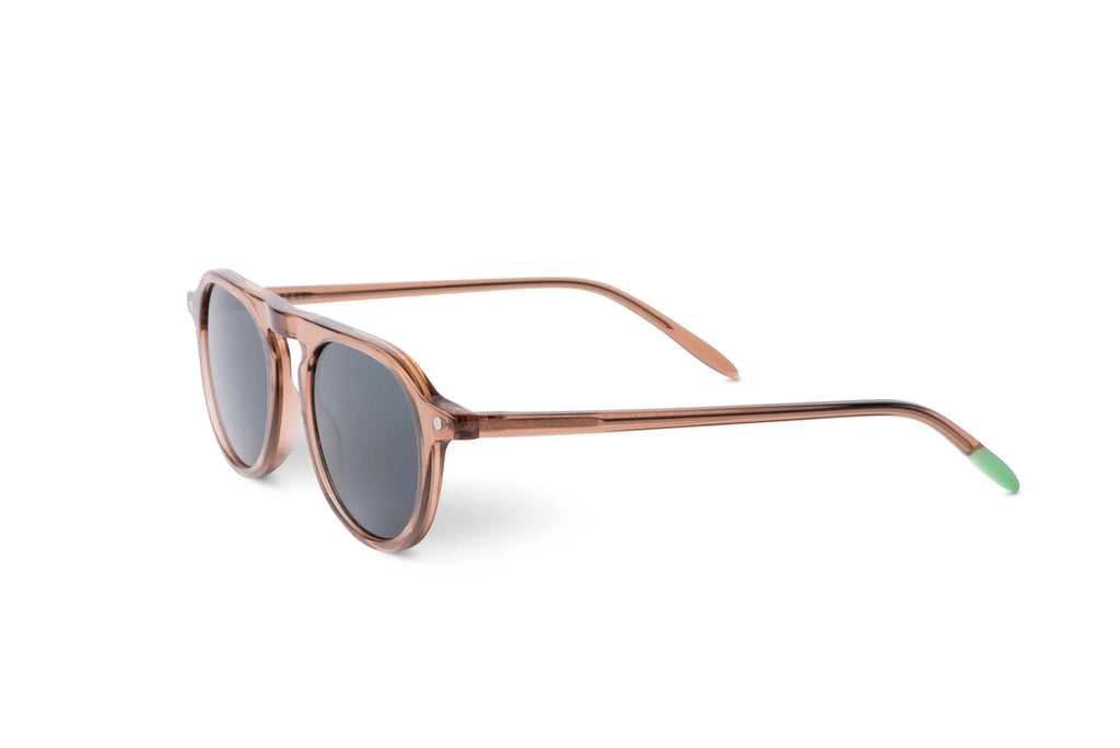 Zingaro Toffee sunglasses, side angle: dark lenses with green-tipped temples