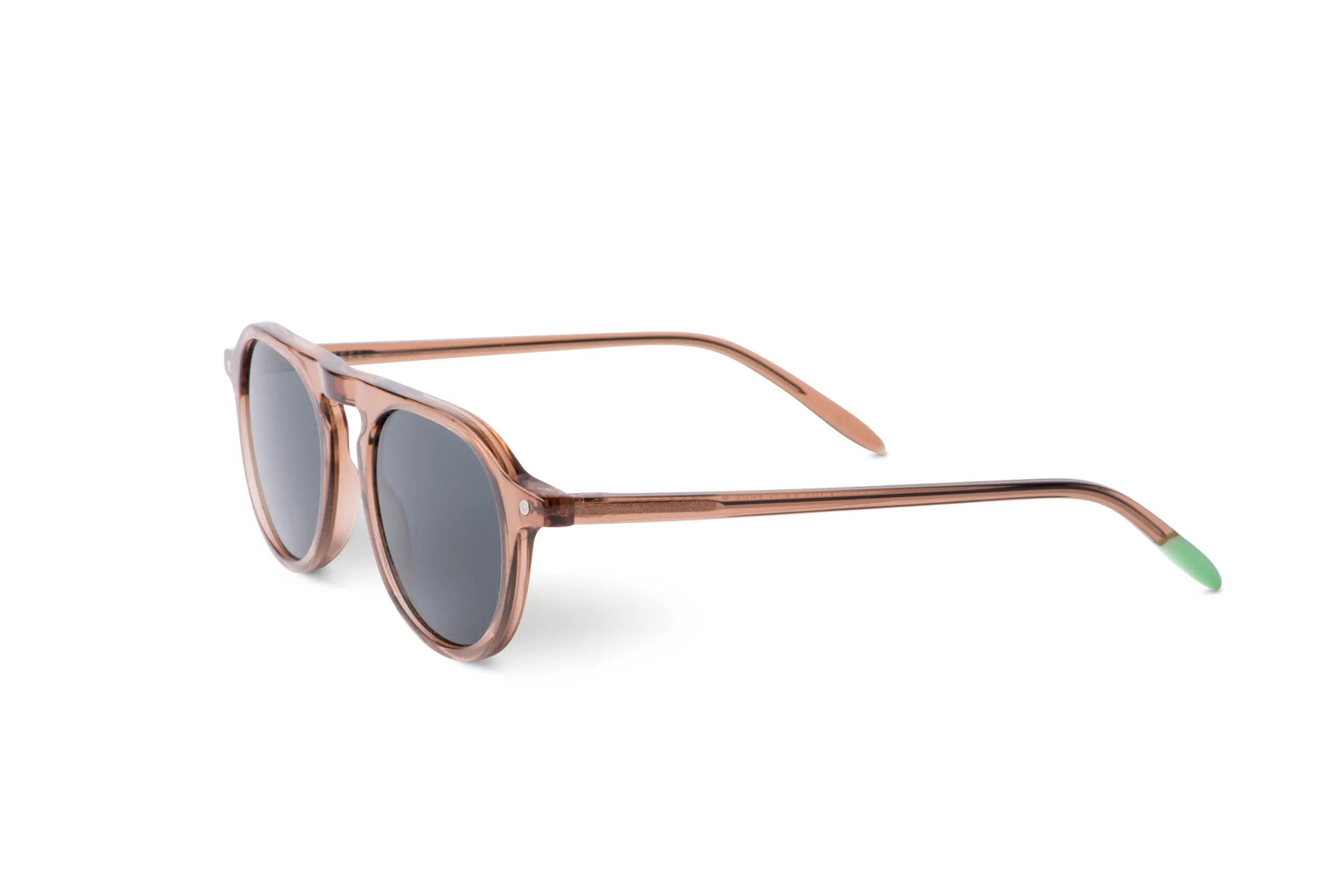 Zingaro Toffee sunglasses, side angle: dark lenses with green-tipped temples