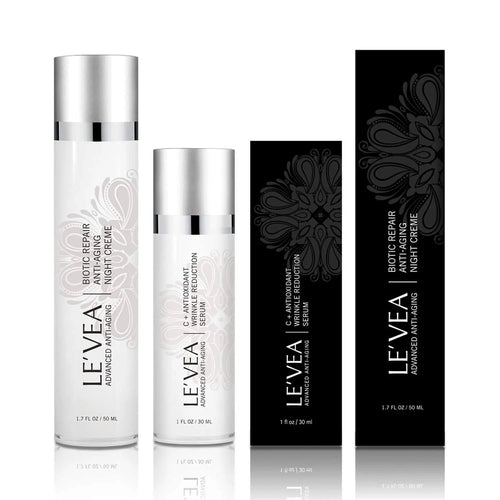 Night Repair Cream + Vitamin C Serum set: bottles and black cartons