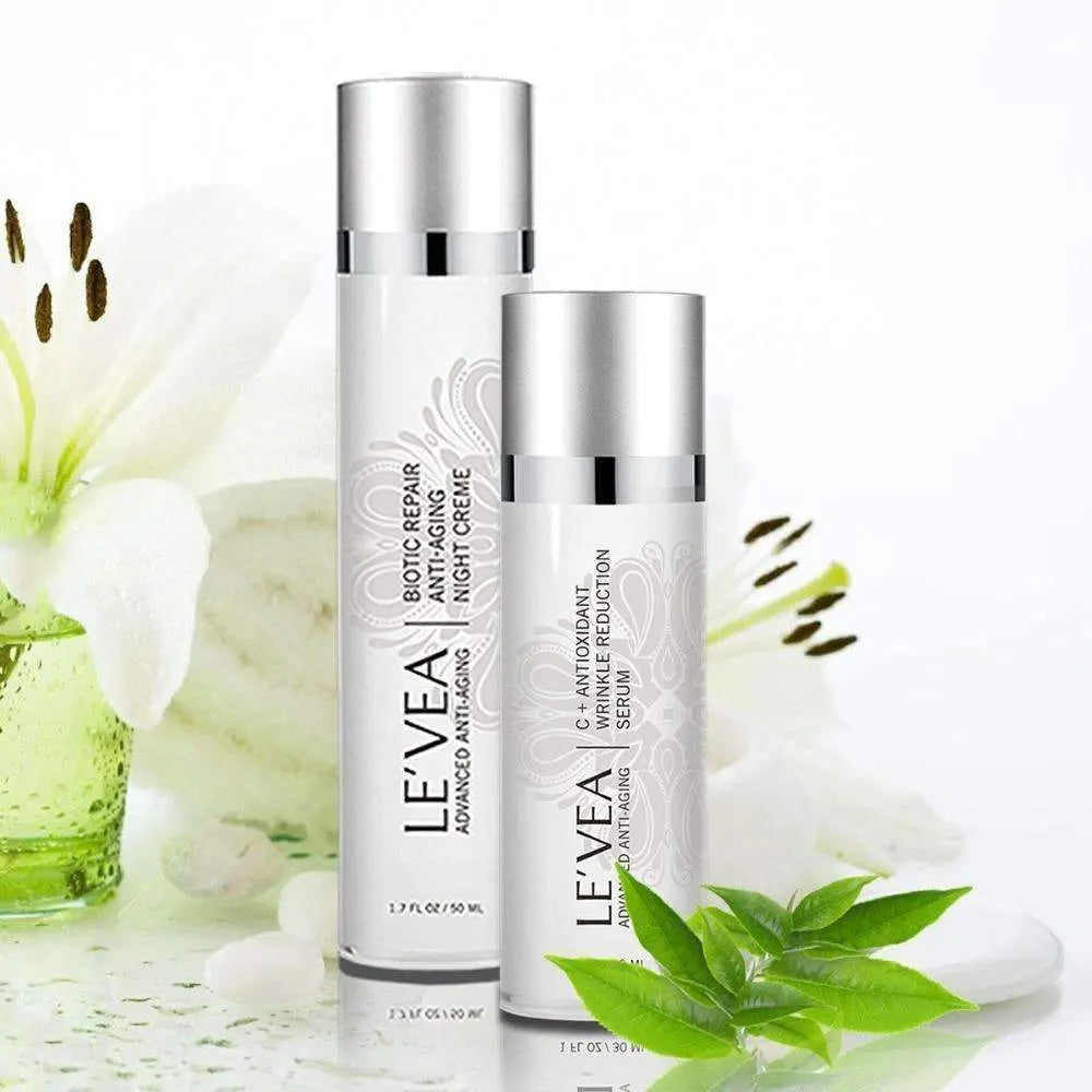 Night Repair Cream + Vitamin C Serum bottles with silver caps and white labels