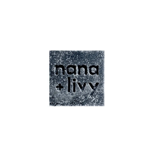 Charcoal mint salt block, dark speckled stone with embossed logo