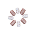 Press-on nails set: rose-gold glitter tips and glossy white nails with delicate rose-gold accents