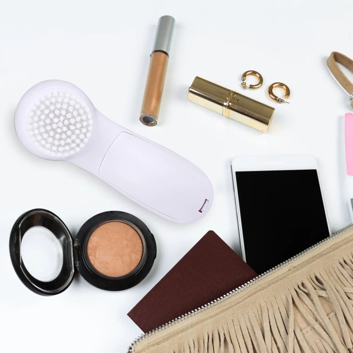 Pink facial cleansing brush kit with five interchangeable heads and white brush handle