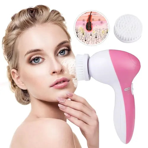 Pink facial cleansing spin brush with bristle head being used on the cheek