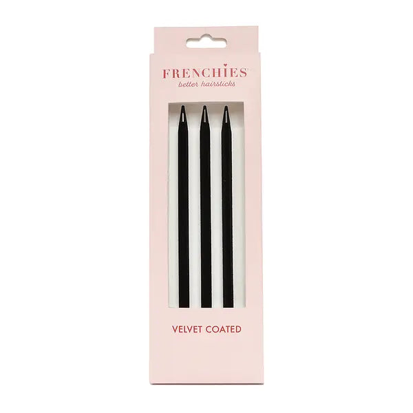 Black velvet-coated hairsticks set on retail card