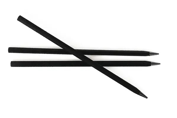 Three black velvet-coated hairsticks with pointed ends