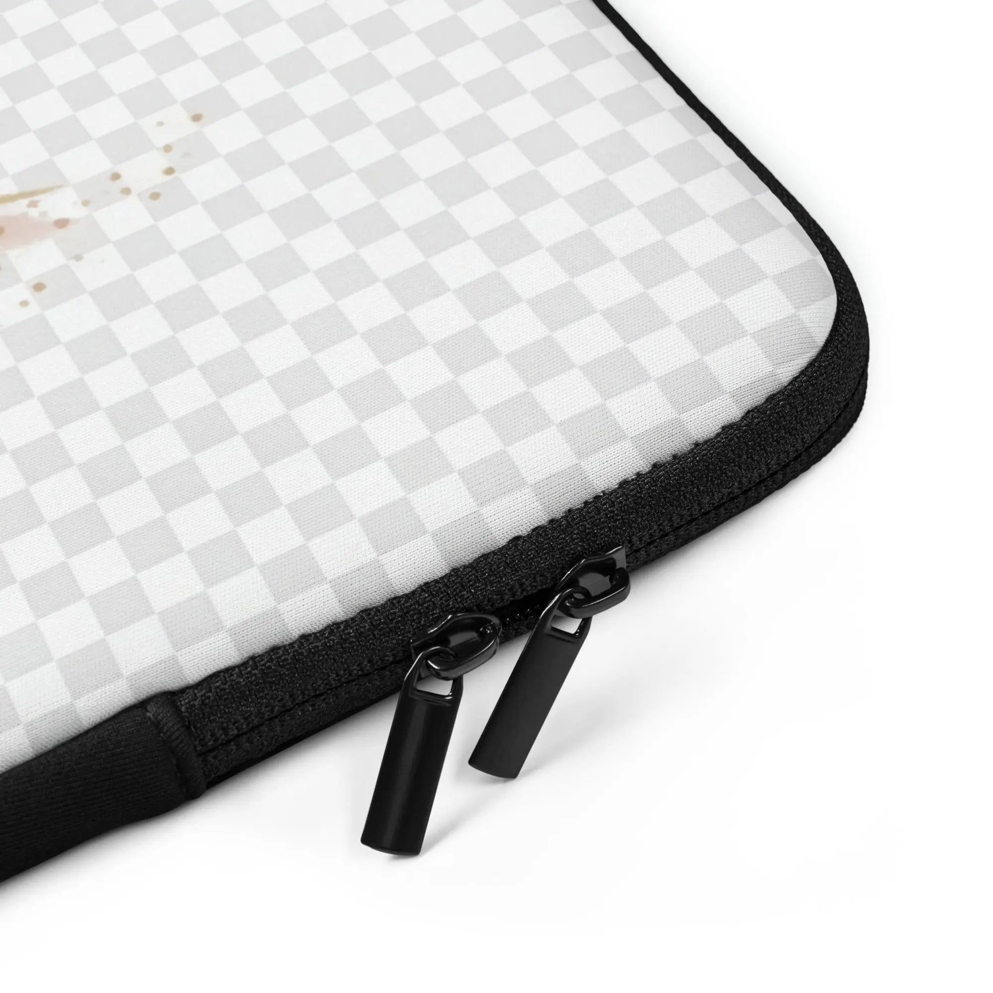 Laptop sleeve front view: white checkered fabric with black zipper and pull tabs