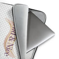 Laptop sleeve, light gray with black trim, holding a silver laptop