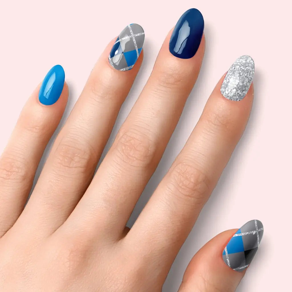 Elegant Blue nails: navy, light-blue, silver glitter and blue argyle details