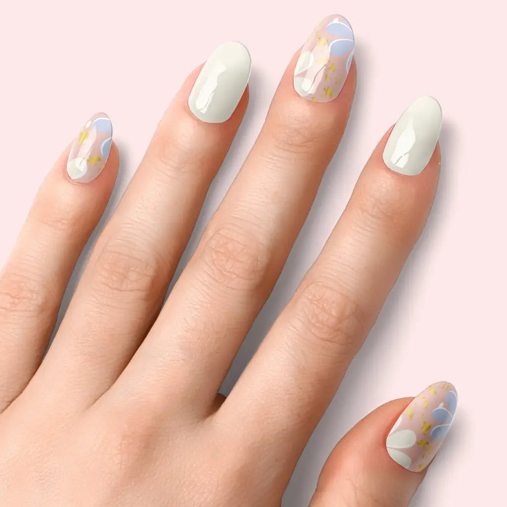 Petals press-on nails: long almond shape with pale white tips and pastel flower details