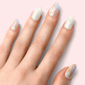 Petals press-on nails: long almond shape with pale white tips and pastel flower details