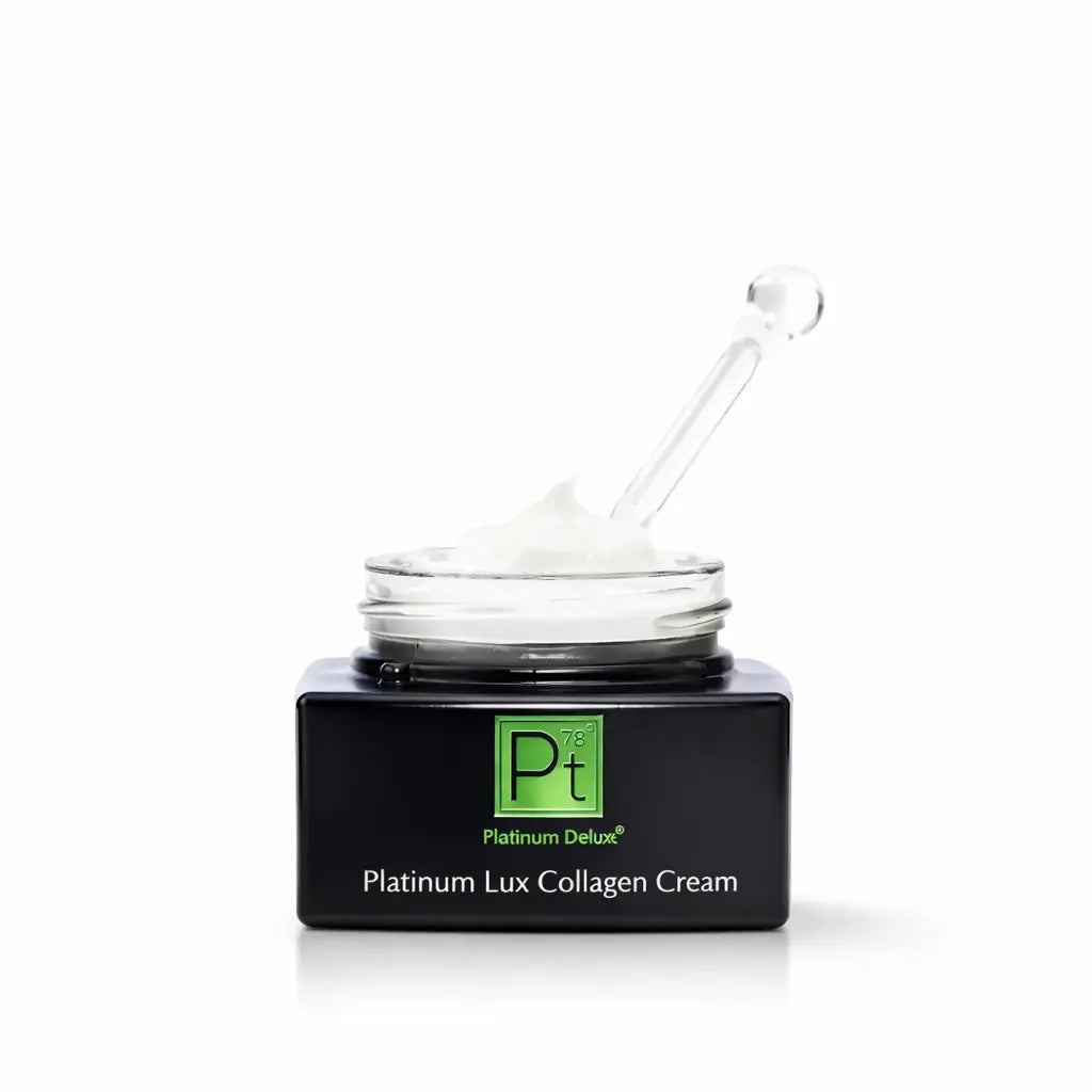 Platinum Lux Collagen Cream jar with scoop holding a dollop of white cream