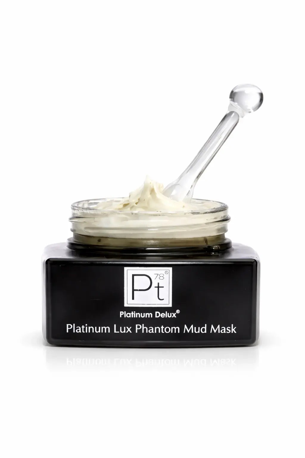 Platinum Lux Phantom Mud Mask open jar with white cream and applicator scoop