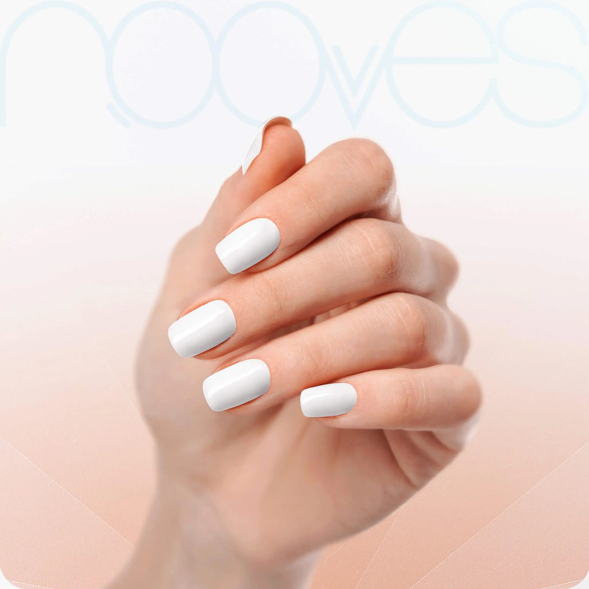Close-up of white gel nail strips on fingers, short square manicure nails